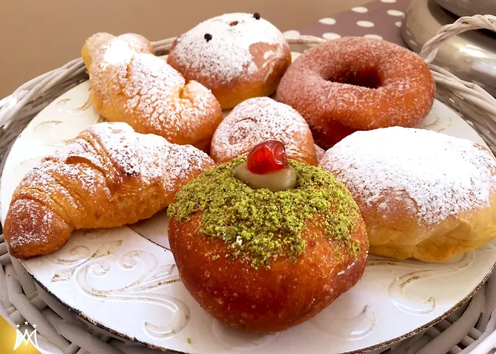 马尼菲卡特酒店 3* 卡诺萨圣尼塔