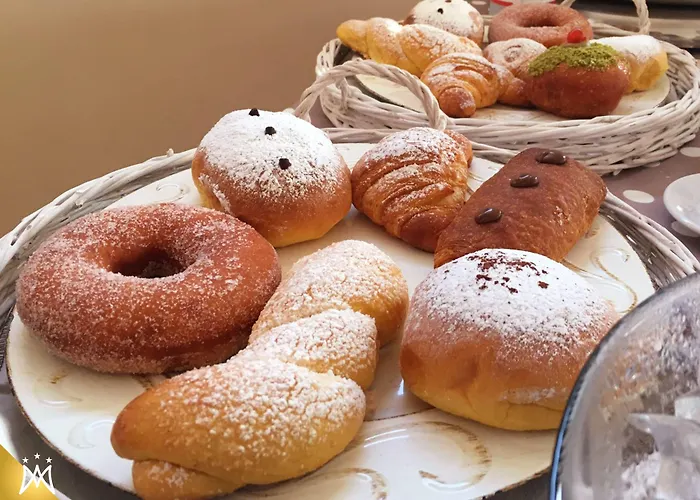 马尼菲卡特酒店 酒店 卡诺萨圣尼塔